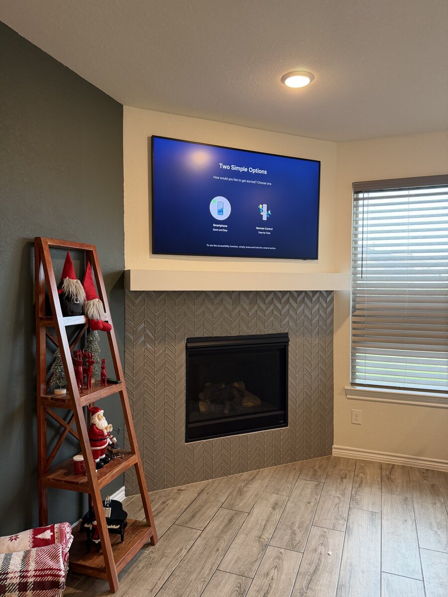 TV mounted above fireplace with concealed wires, Houston TX #3